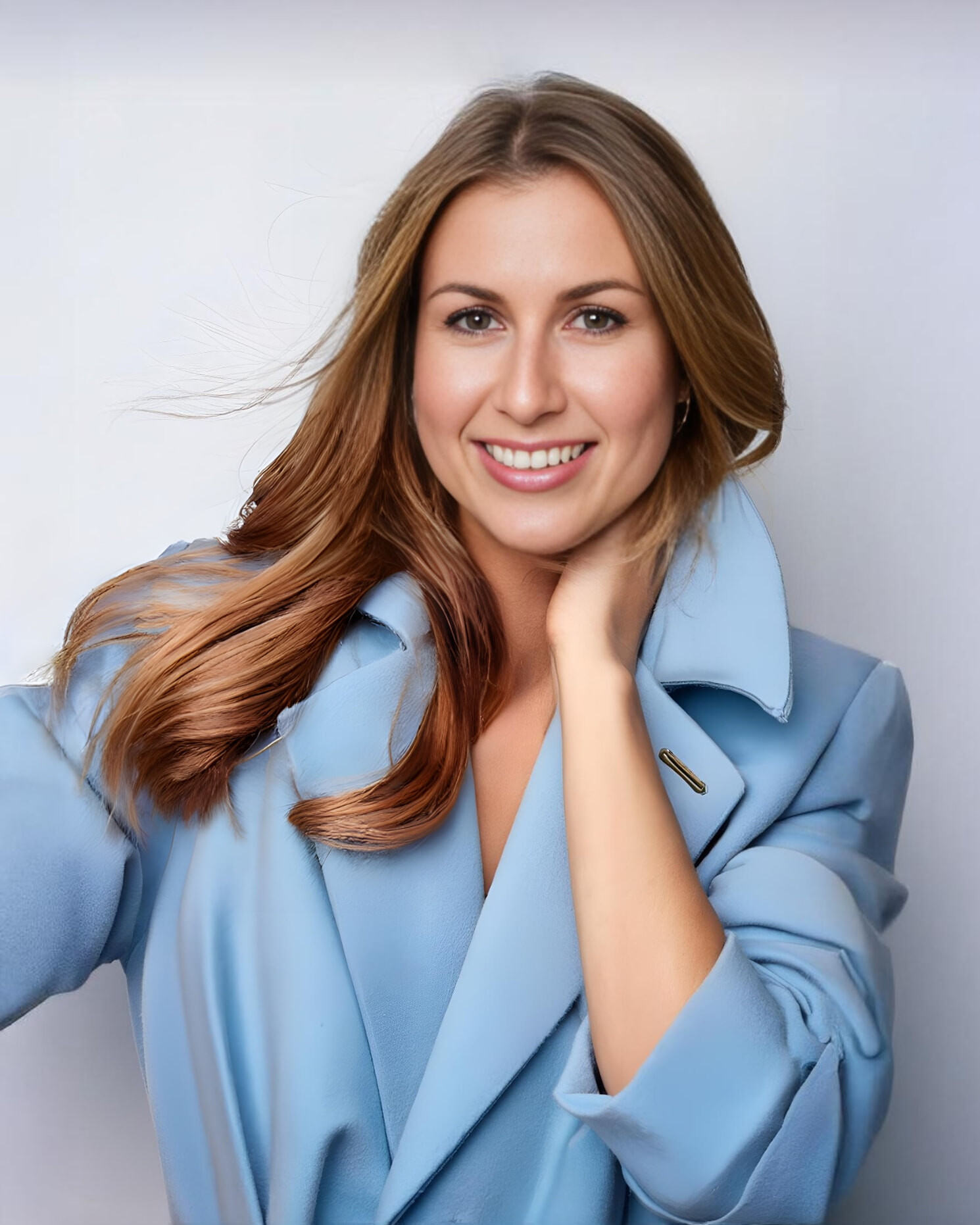 Portrait of Heather Saxon-Simon in a powder blue coat